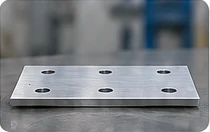 Finished aluminium mounting plate with six holes and slight spring-back.